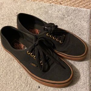 Black Vans with brown and gold detailing